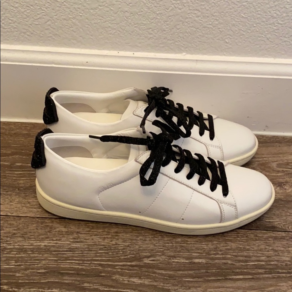 White YSL sneakers with black laces